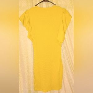 Nice lightweight stretch sweater dress yellow. Size L